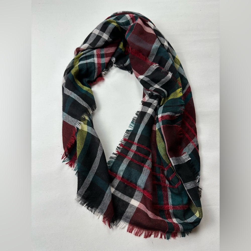 Plaid scarf with velvety red stripes. Size: 40x40 inches. Small hole.